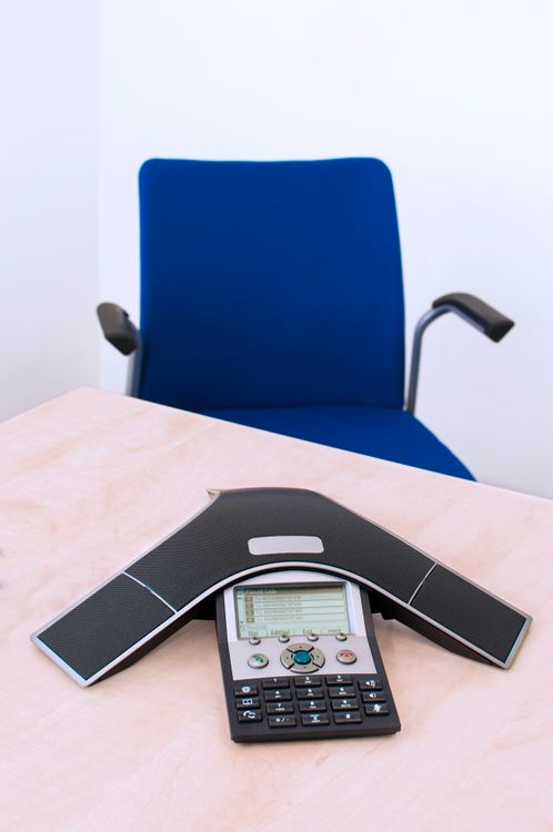 Conference telephone on an office table